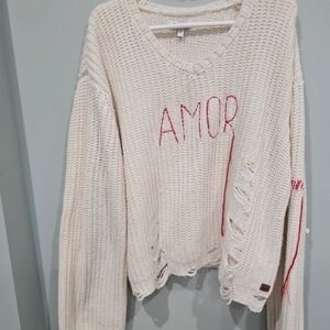 Peace Love World Off-White V-Neck Sweater with Red Accents